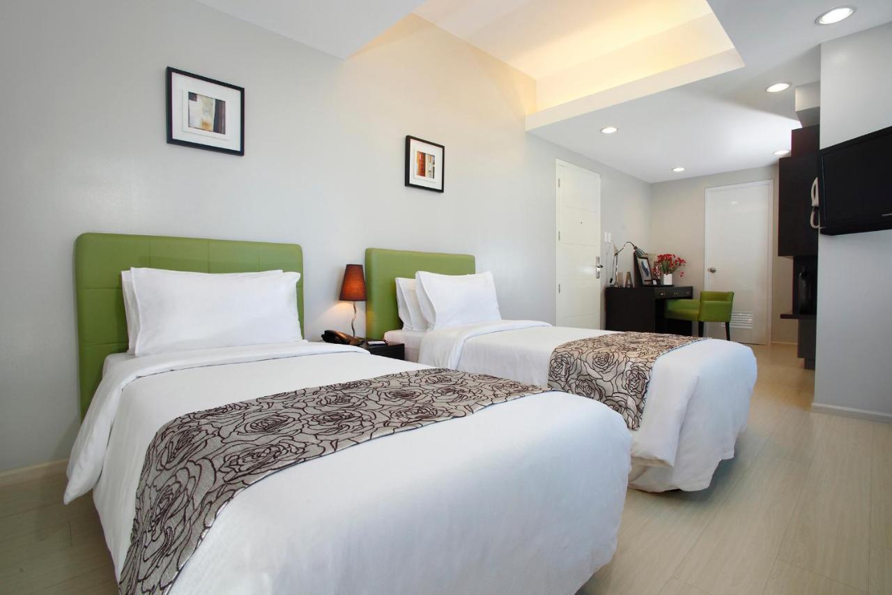 The Exchange Regency Residence Hotel Managed By Hii Pasig City Экстерьер фото