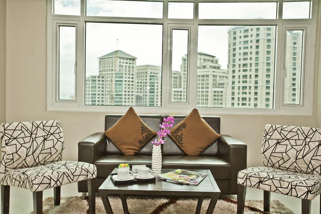The Exchange Regency Residence Hotel Managed By Hii Pasig City Номер фото