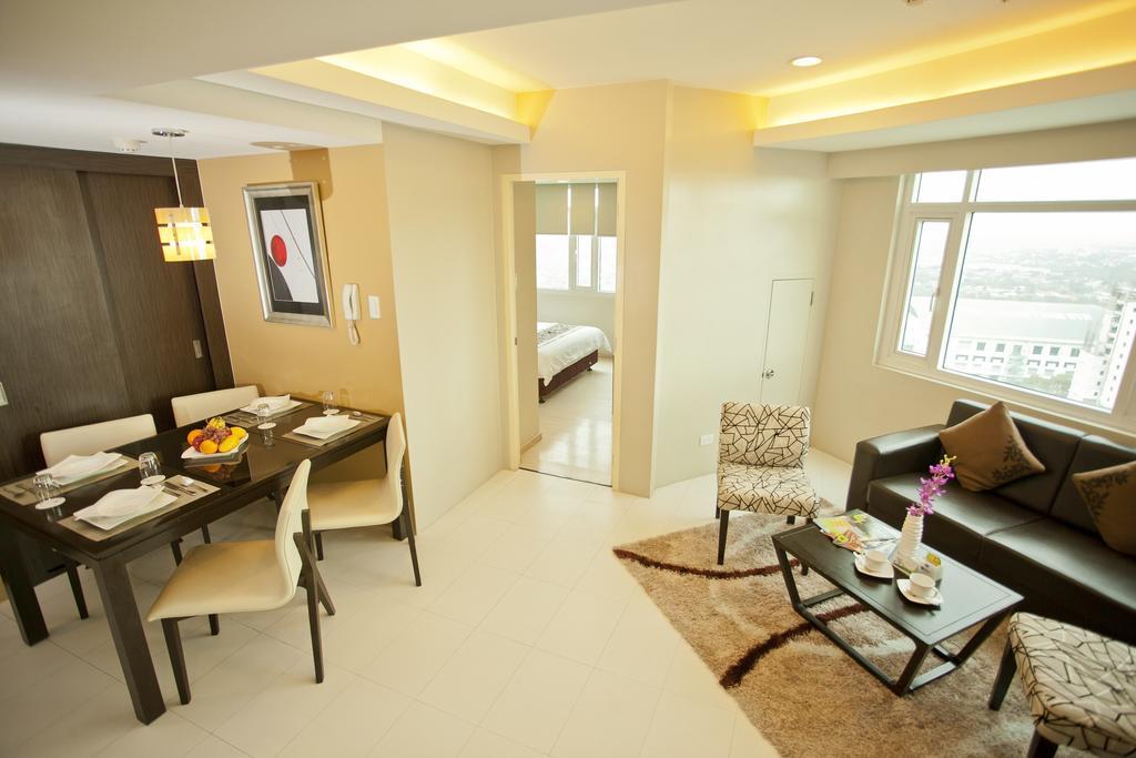The Exchange Regency Residence Hotel Managed By Hii Pasig City Номер фото