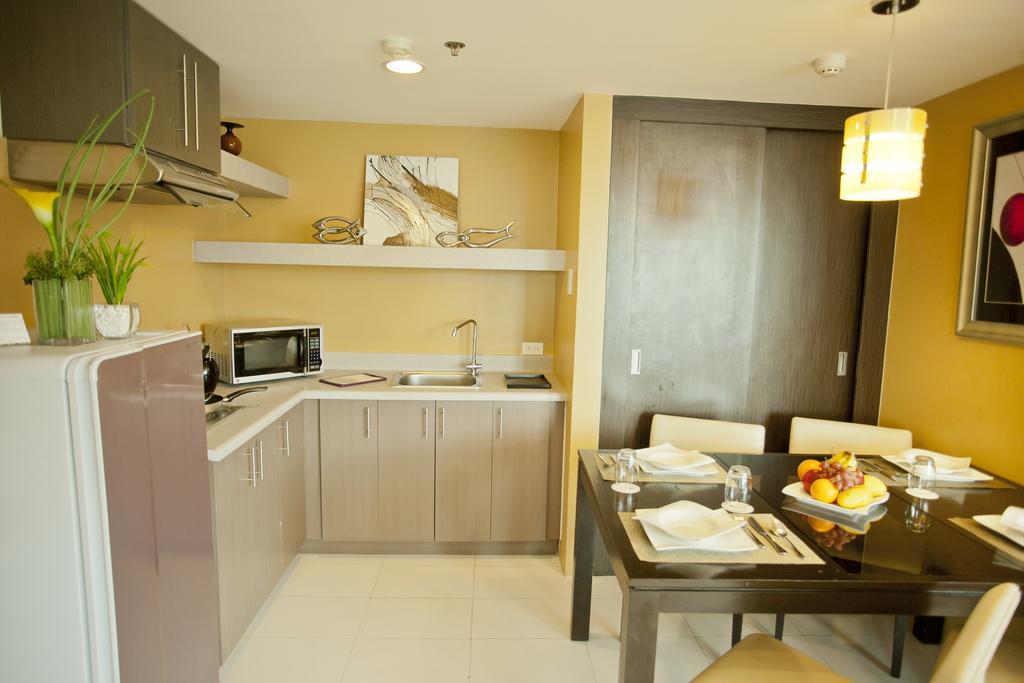 The Exchange Regency Residence Hotel Managed By Hii Pasig City Номер фото