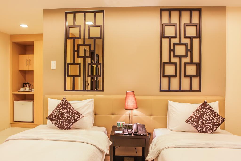 The Exchange Regency Residence Hotel Managed By Hii Pasig City Экстерьер фото