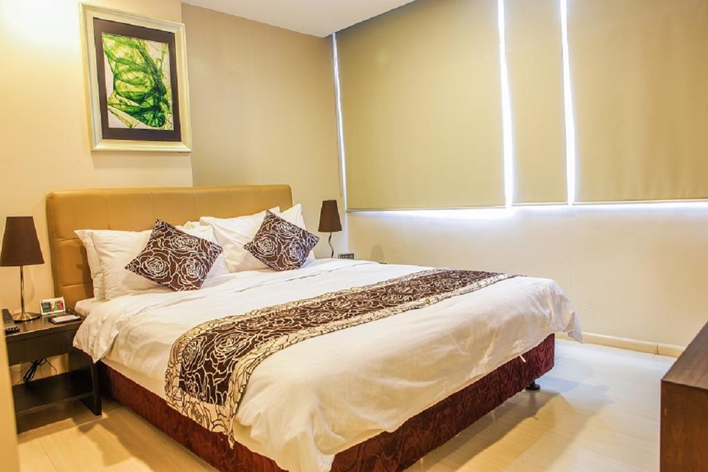 The Exchange Regency Residence Hotel Managed By Hii Pasig City Экстерьер фото