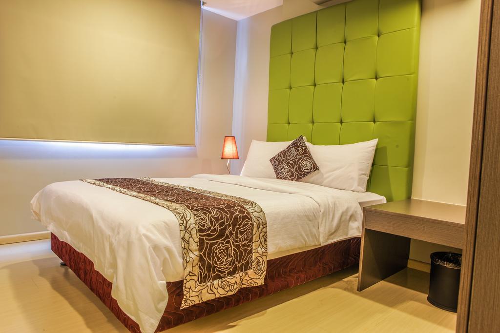 The Exchange Regency Residence Hotel Managed By Hii Pasig City Экстерьер фото