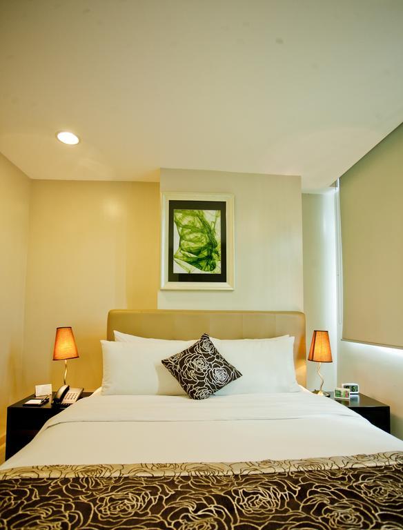 The Exchange Regency Residence Hotel Managed By Hii Pasig City Экстерьер фото